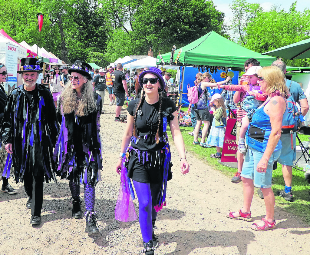 Way of the Wyrd Morris Dancers in the festival’s main avenue.