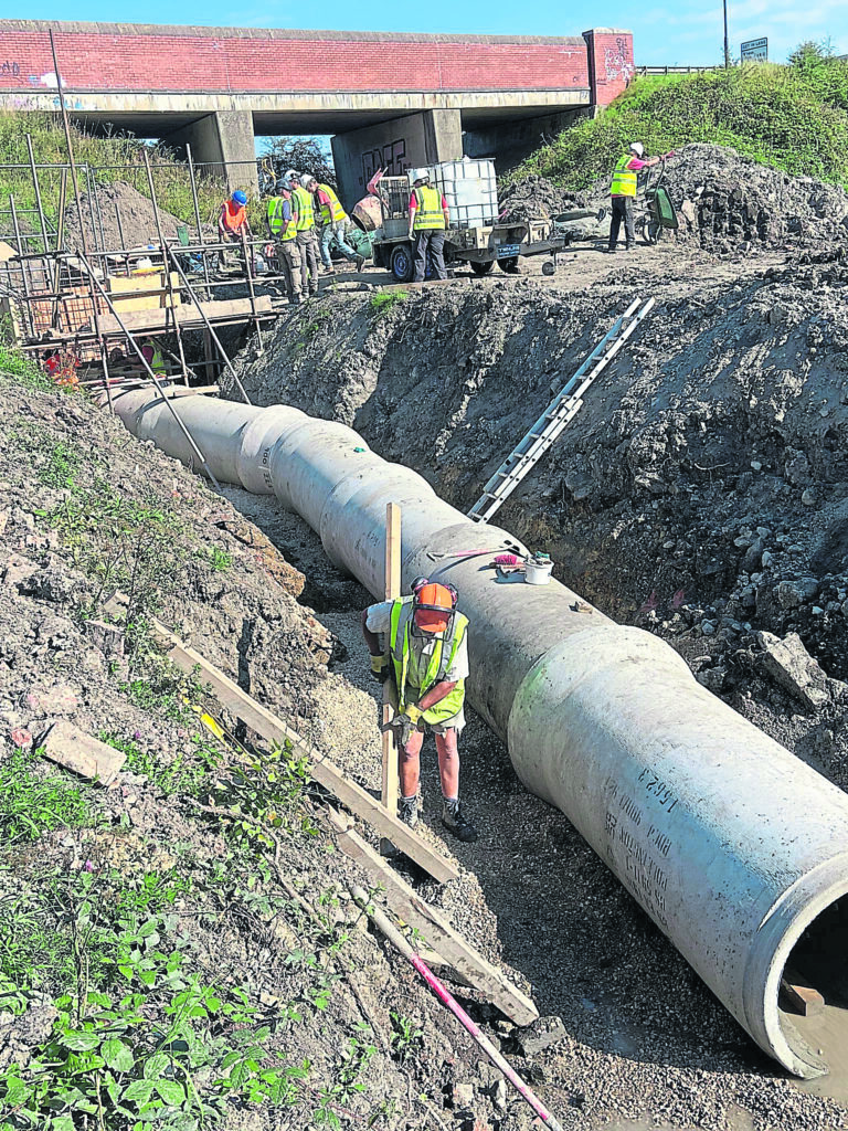 Pipe being put into place.