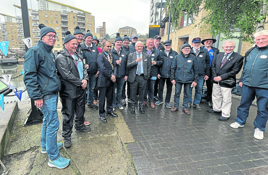 The crew with Canal & River Trust chairman David Orr and guests for the unveiling ceremony. (Inset: the commemorative plaque.) PHOTOS: CANAL & RIVER TRUST