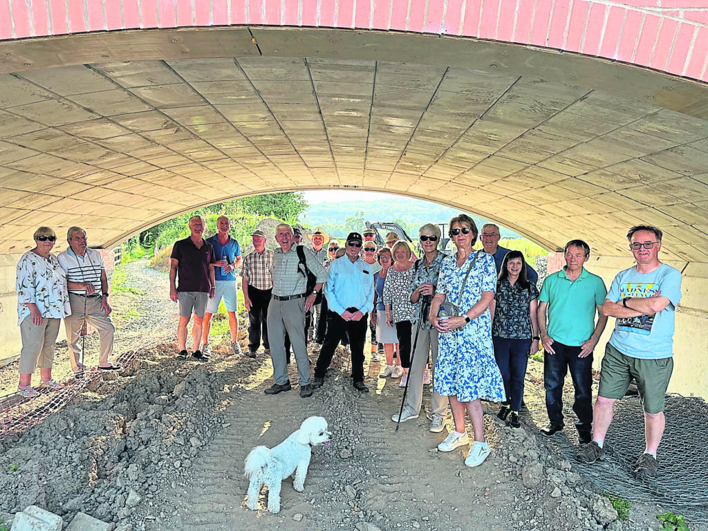 Borderland Rotarians see the underneath of the newly built Schoolhouse Bridge, which was opened in June this year and forms part of the Montgomery Canal restoration project.