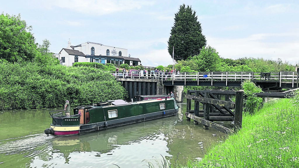 The narrowboat Peregra navigates the canal under Sellars Swing Bridge. PHOTO: CRT