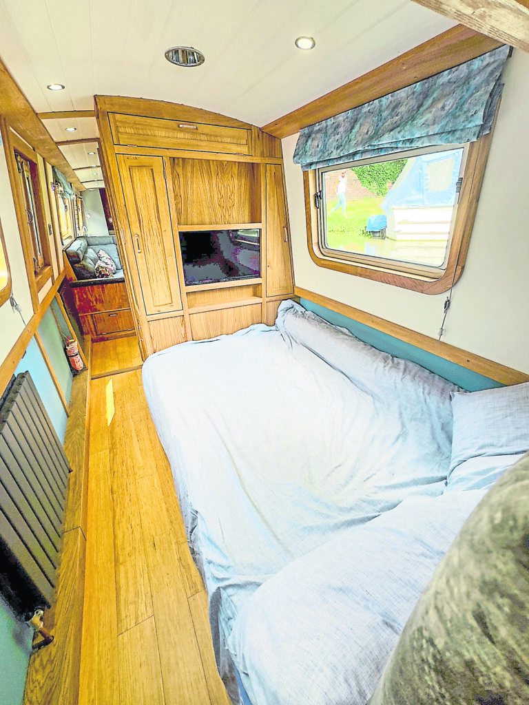 The main bedroom and saloon beyond.