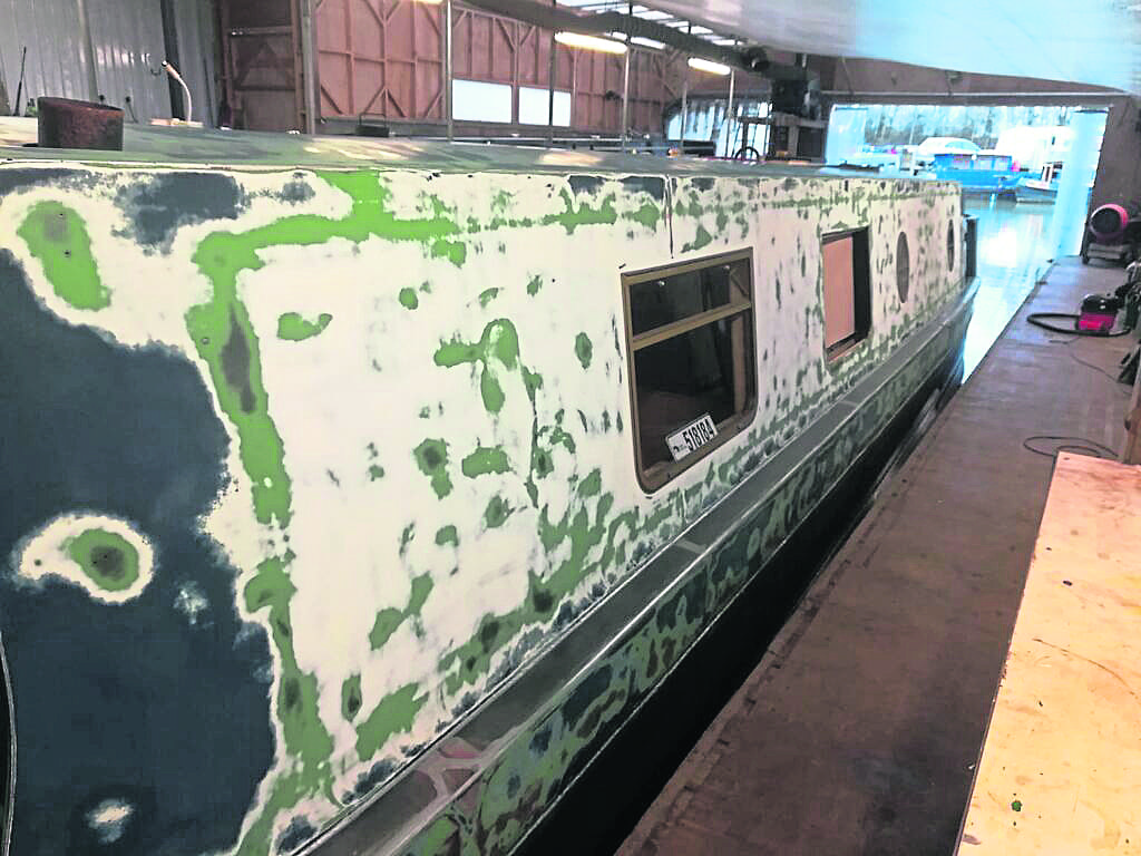 Rusty areas on Flax were needle-gunned as necessary and treated with a rust inhibitor. The surface was sanded to make it as sound as possible.  PHOTOS: Kate Boats.