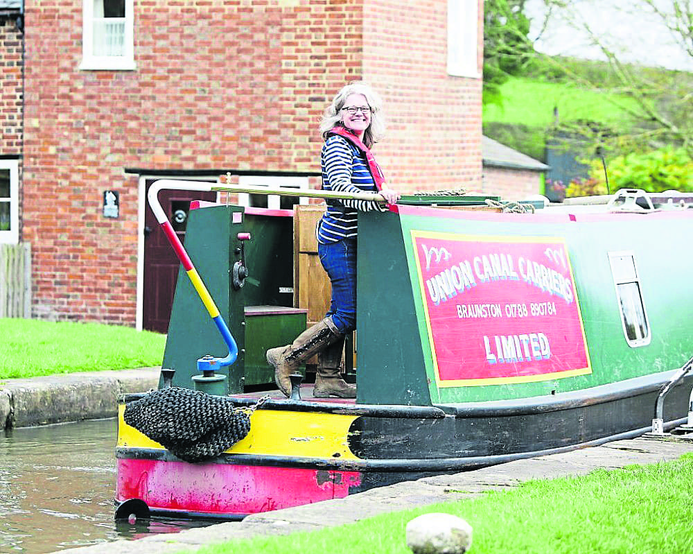 Heather Hewitt on a hire boat from Union Canal Carriers at Braunston in Northamptonshire. The company was crowned the UK’s number one canal boat hire base by holiday company Roam&Roost, based on customer reviews.