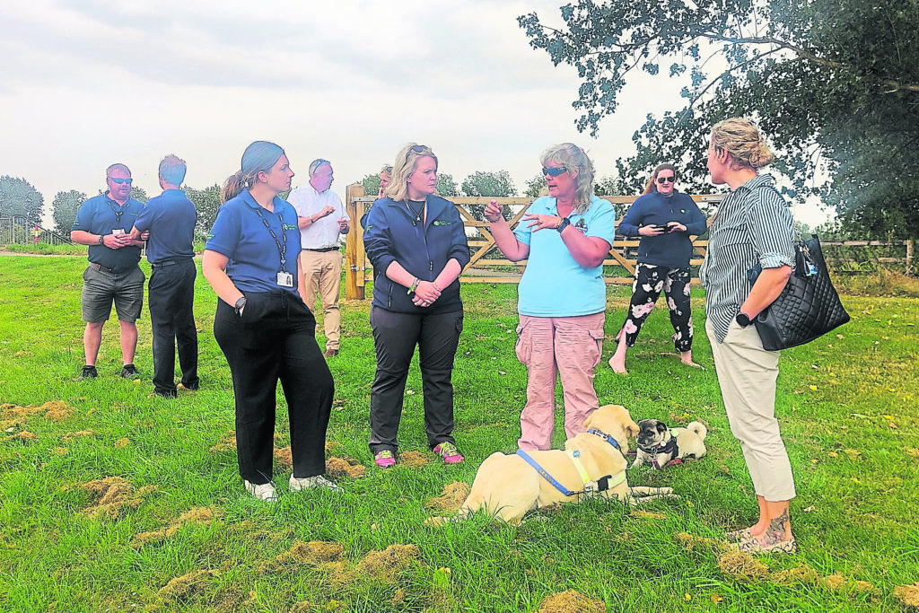 Tracey and Tim Clarke, founders of the Accessible Waterways Association, meet Environment Agency officials at the Denver Complex in Norfolk on August 8. PHOTOS: AWA