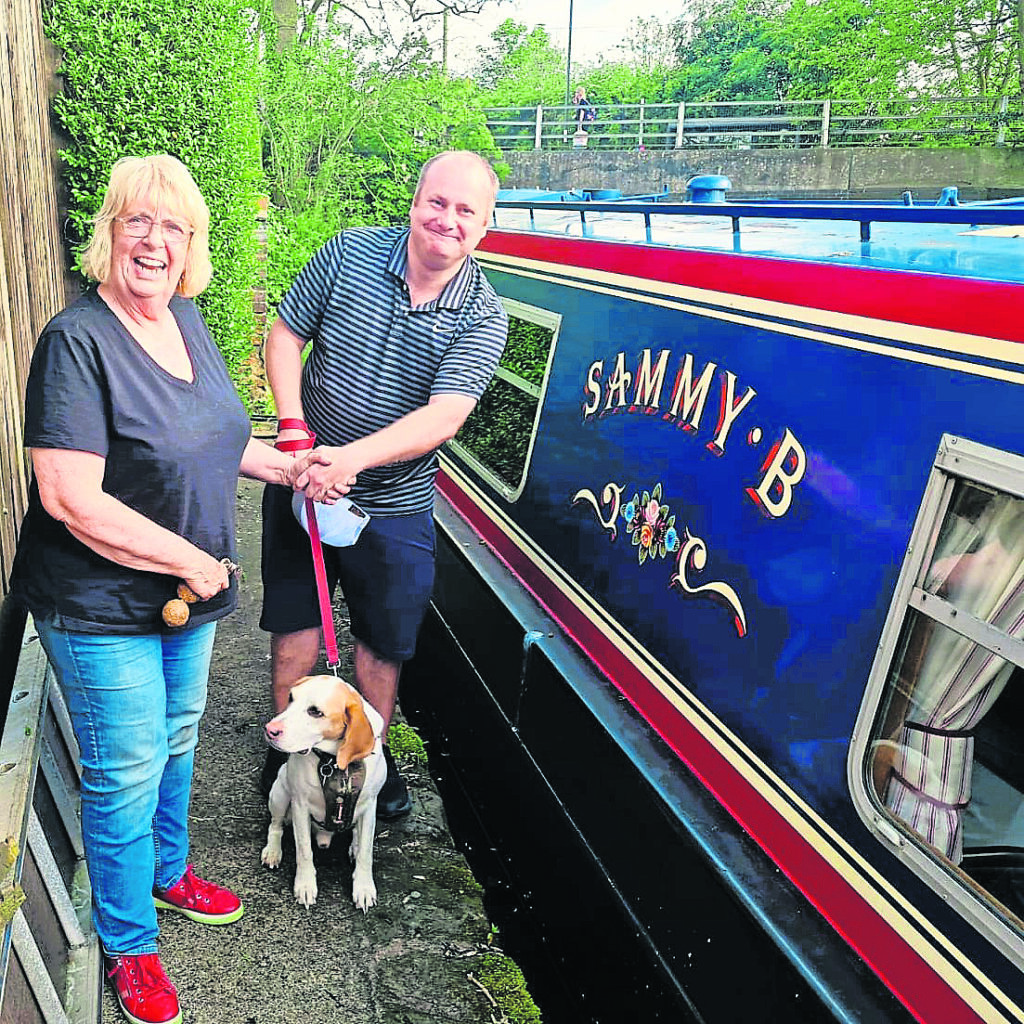 Andy Flint receiving the Sammy B from its owner Judy.