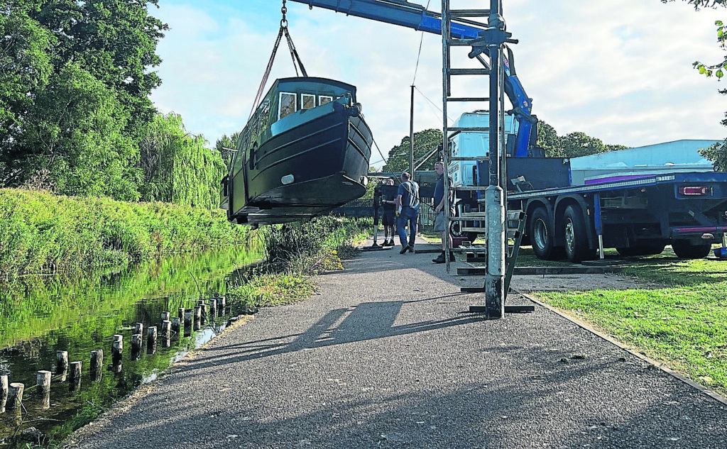 The Benjamin Handley is lifted into the River Slea.