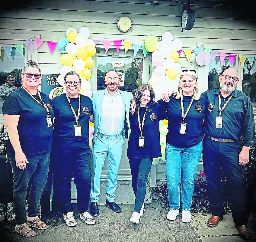 Offering hope: Hannah is pictured with Helen Harrison, mum Gail Iredale, Tony Preston, Tania Bull and stepdad Wayne Iredale at the charity shop she set up at Mercia Marina to raise money for Hannah’s Hope, which aims to provide a lodge for other young patients.