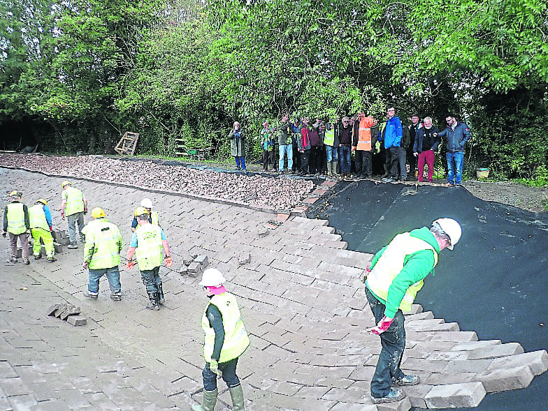 Delegates at the Northern Canals Association November meeting saw Shropshire Union Canal Society volunteers lining part of the waterway with blocks. PHOTO: SUPPLIED