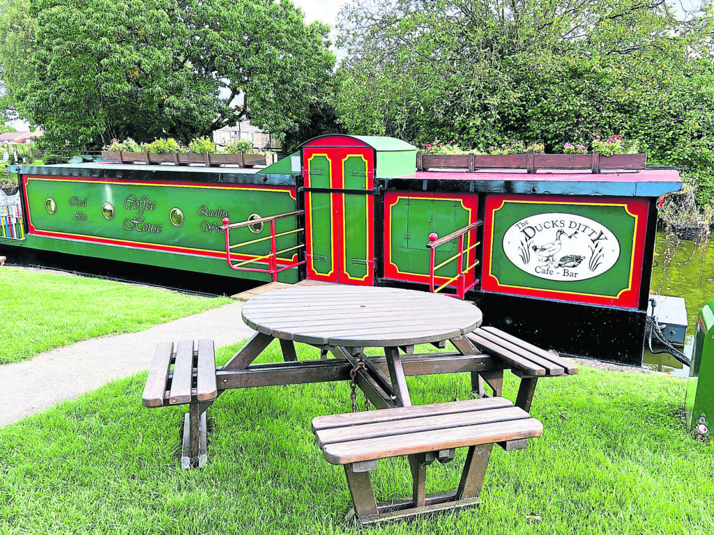 Enjoy refreshments at The Duck’s Ditty, a delightful floating cafe and bar by the towpath. PHOTO: NICOLA LISLE