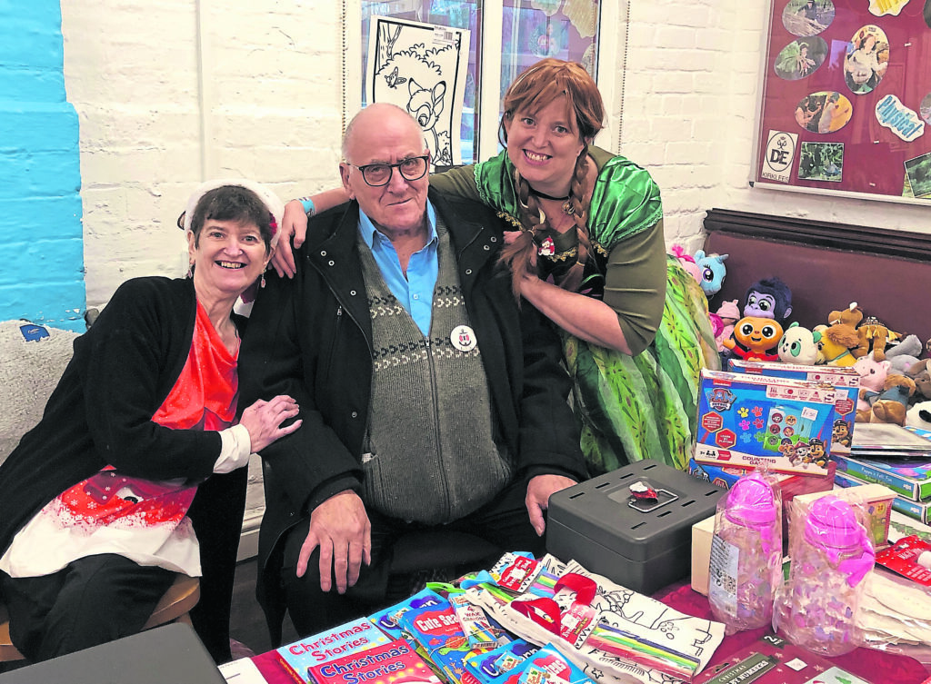 Janet, Les and Kerry bring the festive spirit to the Safe Anchor Trust.