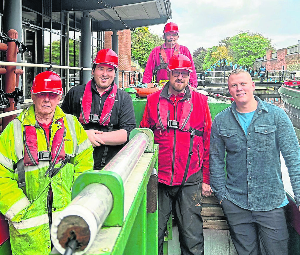 New CEO of the Dudley Canal and Tunnel Trust Paul Crofts (right) with members of the trust team. The trust provides unique boat tours in a network of tunnels and caverns under the town. PHOTO: SUPPLIED