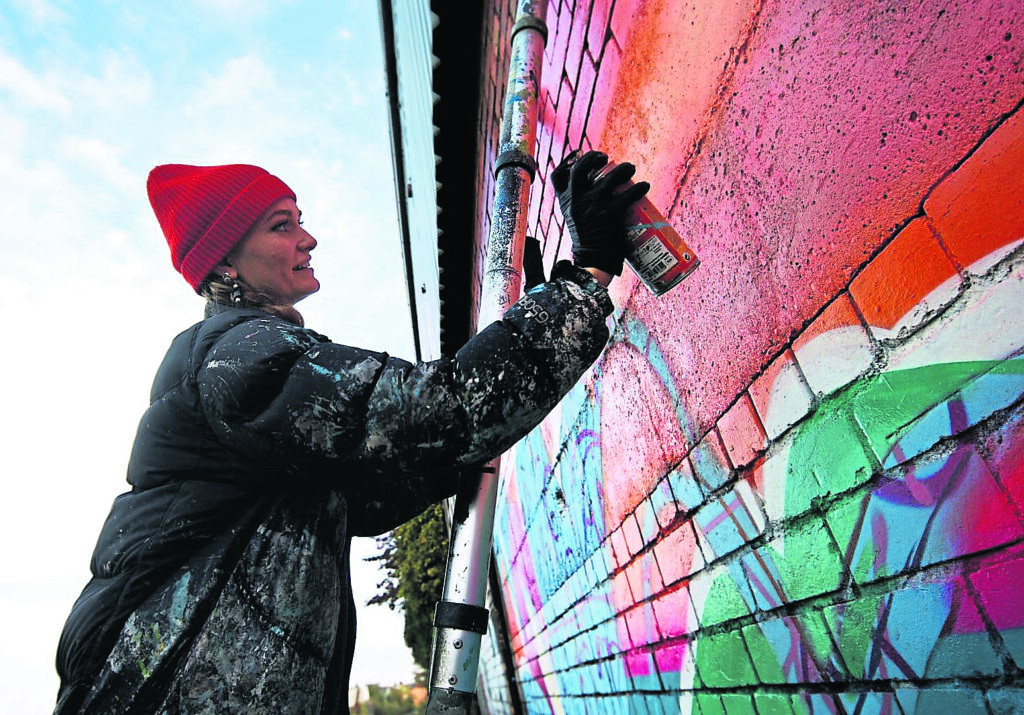 Sheffield artist Grace Visions at the Sheffield & Tinsley Canal, working on the artwork. PHOTO: CRT