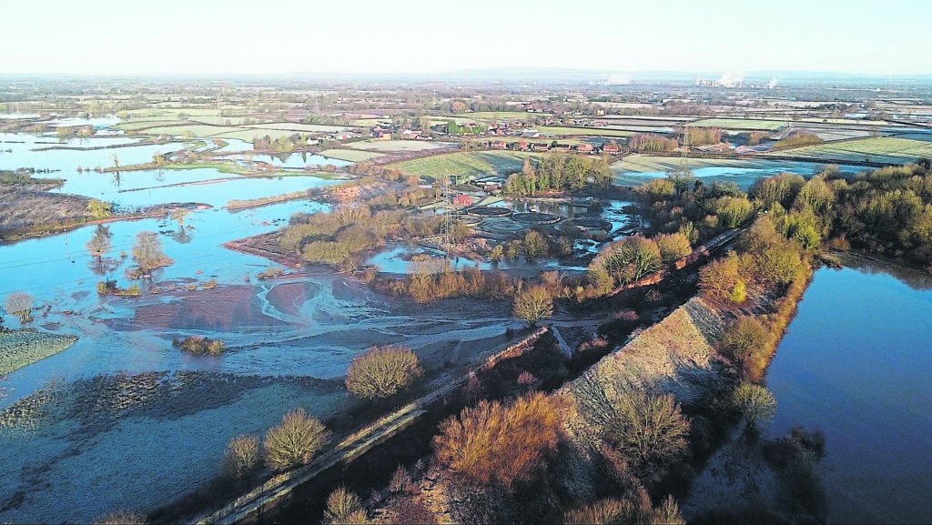 An aerial view of the breach on the Bridgewater Canal shows the extent of the flooding. PHOTO: TAYLORS ABOARD