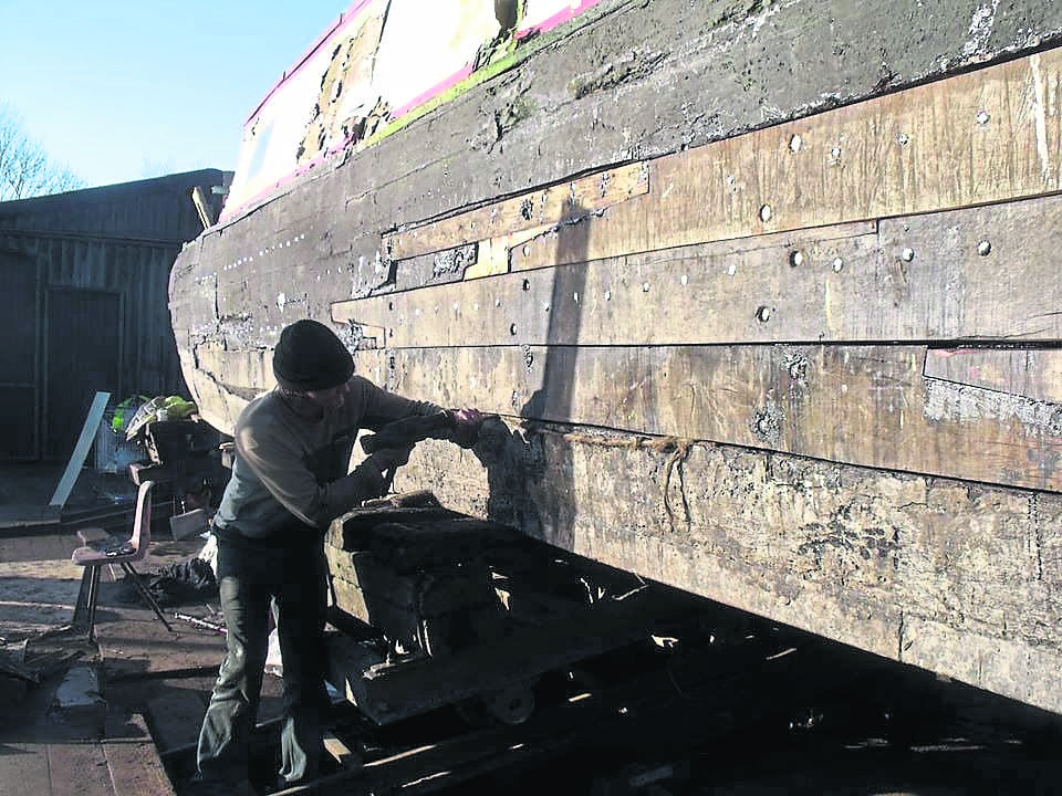Repairs being carried out in 2019 on Southam, which the Wooden Canal Boat Society hopes will be restored to provide well-being trips for people with mental health issues. PHOTO: SUPPLIED
