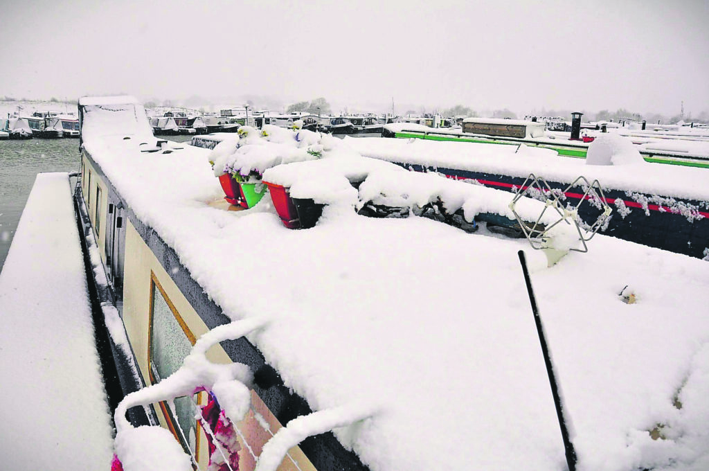 When snow falls in winter it adds a surreal beauty to life along the canal and adjacent to it.