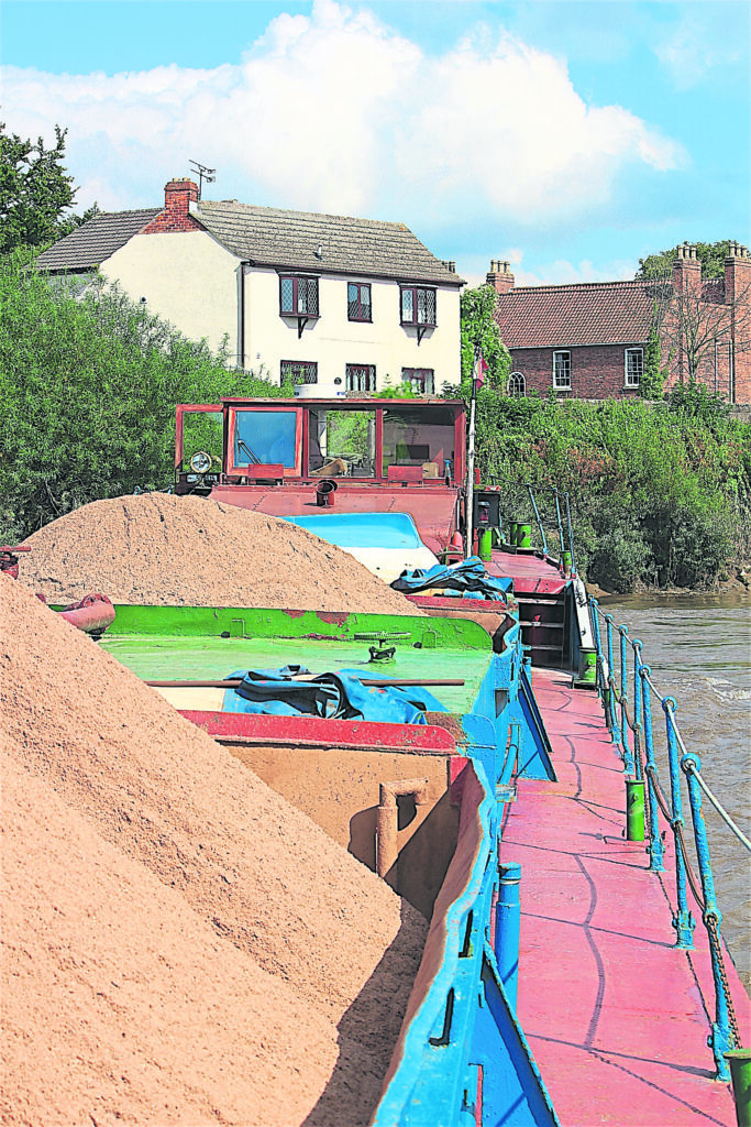 Five hundred tons of aggregate aboard a passing barge makes zero impact on local residents.