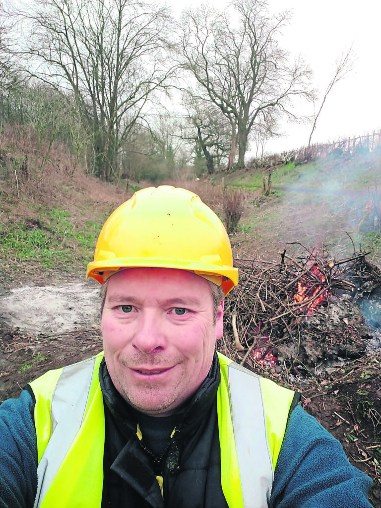 New Shropshire Union Canal Society volunteer Alexander Ford hard at work after joining the group. The society is keen to hear from others who have time to give. PHOTO: SUPPLIED
