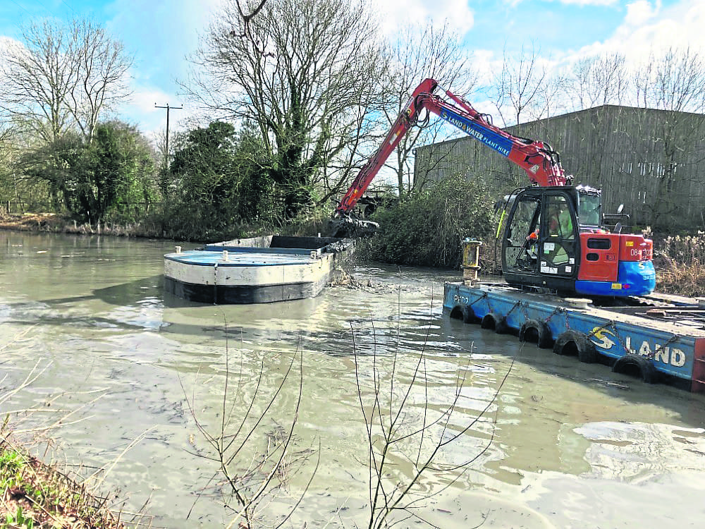 SEDIMENT REMOVED by floating digger