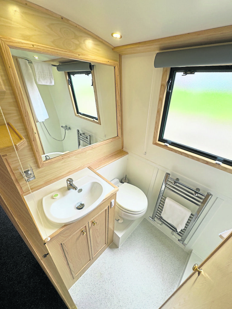 Good sized bathrooms on board helped by the large mirror.