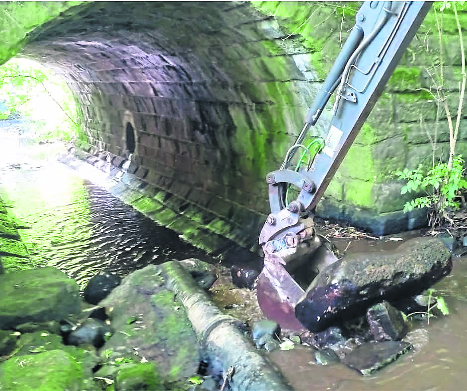 A digger gets to work. PHOTO: WILD TROUT TRUST