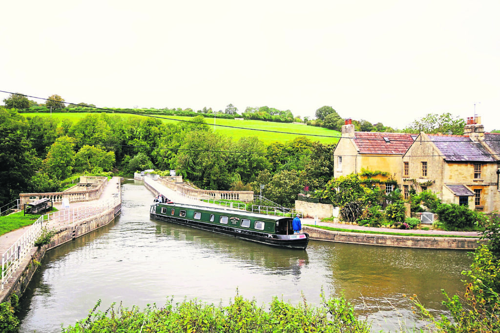 A narrowboat on the Kennet and Avon Canal, Avoncliff. PHOTO: NESSINO- CC BY-SA 3.0