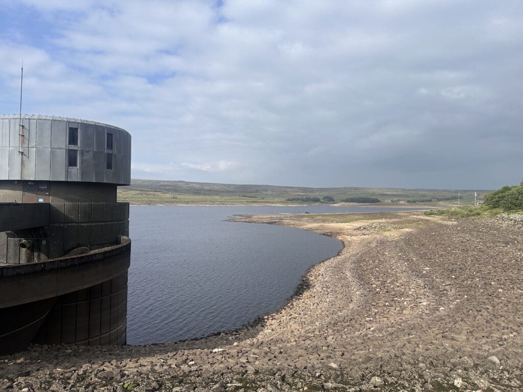 Yorkshire Water-managed Grimwith Reservoir, neighbouring the Yorkshire Dales Sailing Club, showing low water levels in July this year. PHOTO: LUCY WOOD 