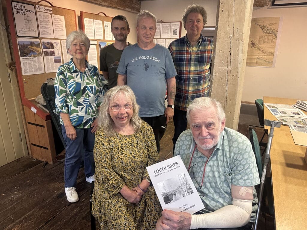 Author and historian Stuart Sizer (front) with Louth Navigation Trust secretary Paula Hunt and fellow trust members at the launch of his new book. PHOTO: LUCY WOOD