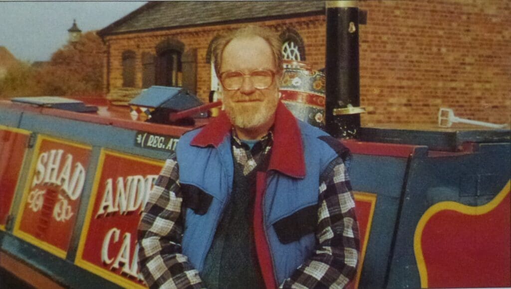 Alan Firth canal-side in 1993. This photograph was taken for the Wedgwood brochure Waterways By Winter Moonlight. Although there is a narrowboat behind him, it is not his. Alan never owned a boat and did not even go hire-boating with his family – but painting the canals as they once might have been, became his life’s work. PHOTO: WEDGEWOOD