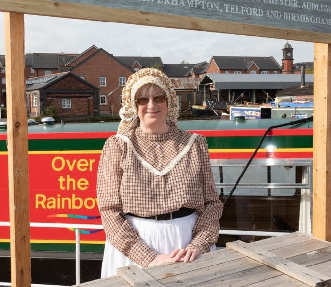 Barbara is famous for dressing up in traditional canal dress.