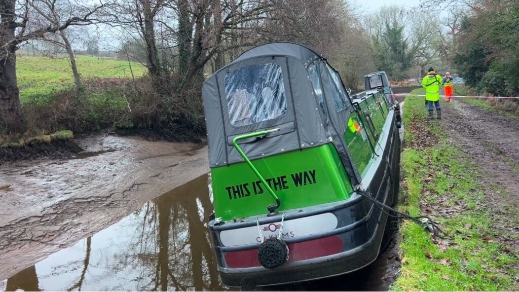 One of the many boats affected when the breach drained the canal of water. PHOTO: Facebook/Paul Smith-Storey