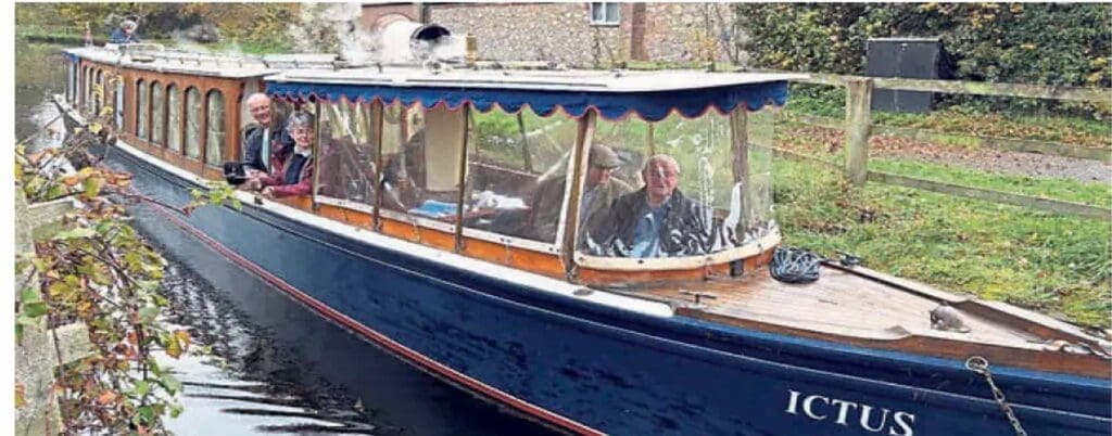 From left: Michael Limbrey, Coun Heather Kidd and (seated) John Dodwell and Coun Roger Evans watch the passage through Crofts Mill Lift Bridge.