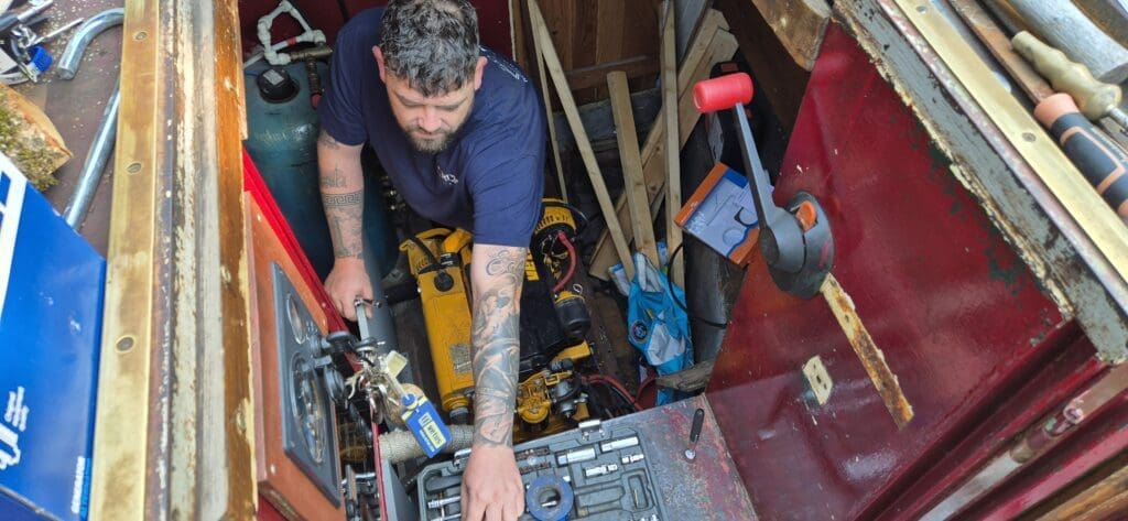Engineer working on an engine
